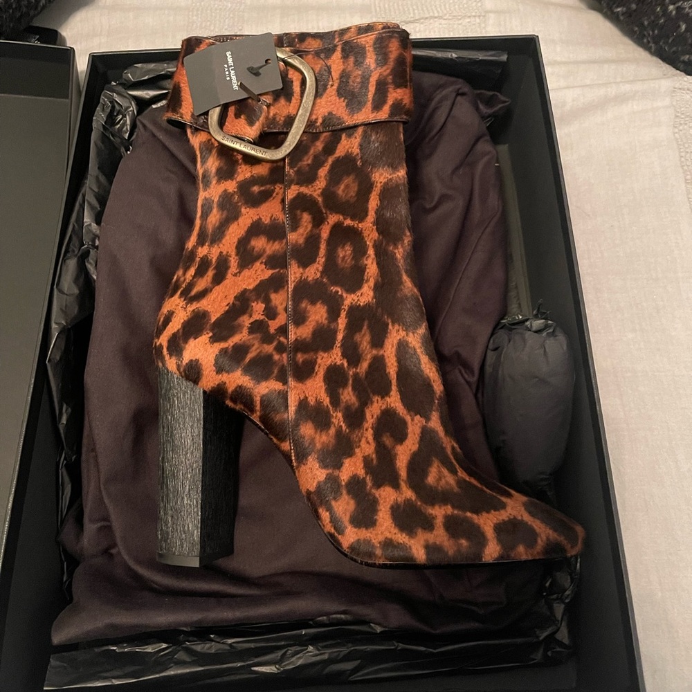 Brand new with bags, box and tags.
